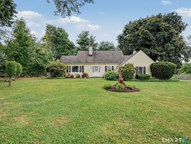 Welcome home to this charming Cape nestled in a sought-after