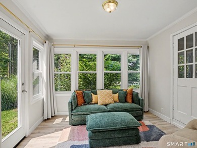 Welcome home to this charming Cape nestled in a sought-after - photo 7