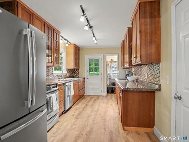 Welcome home to this charming Cape nestled in a sought-after - photo 9