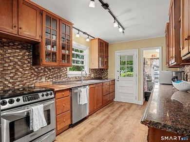 Welcome home to this charming Cape nestled in a sought-after - photo 10