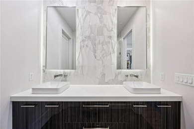 PRIVATE ELEVATOR TO ALL 4 FLOORS! Perfectly positioned in one of