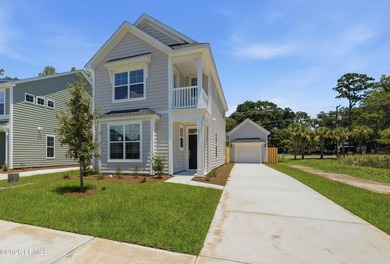 This two-story home includes three bedrooms and two-and-one-half - photo 1