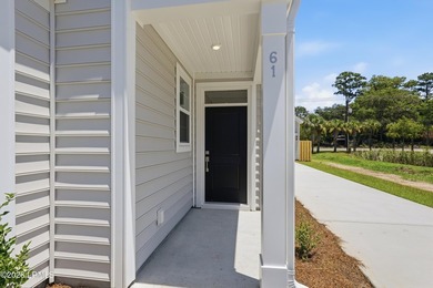This two-story home includes three bedrooms and two-and-one-half - photo 3