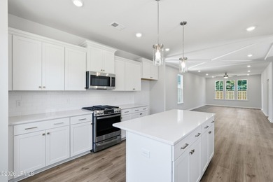 This two-story home includes three bedrooms and two-and-one-half - photo 5