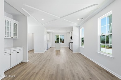 This two-story home includes three bedrooms and two-and-one-half - photo 8