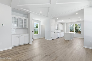 This two-story home includes three bedrooms and two-and-one-half - photo 9