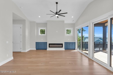 Experience elevated coastal living at 1624 Sunrise Lane in