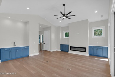 Experience elevated coastal living at 1624 Sunrise Lane in