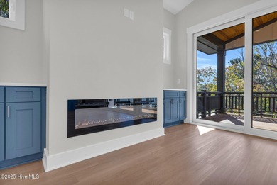 Experience elevated coastal living at 1624 Sunrise Lane in