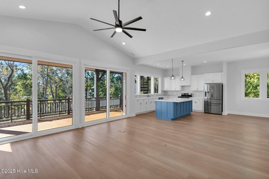 Experience elevated coastal living at 1624 Sunrise Lane in