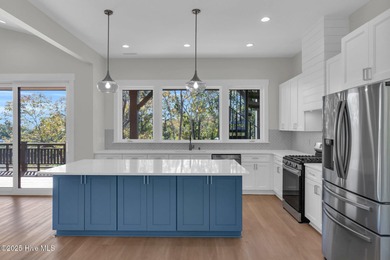 Experience elevated coastal living at 1624 Sunrise Lane in