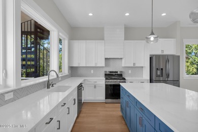 Experience elevated coastal living at 1624 Sunrise Lane in