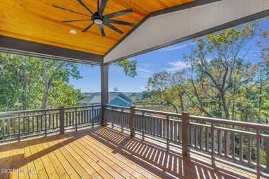 Experience elevated coastal living at 1624 Sunrise Lane in