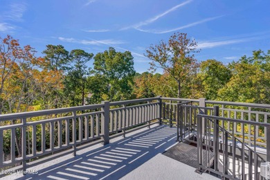 Experience elevated coastal living at 1624 Sunrise Lane in