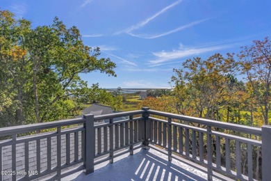 Experience elevated coastal living at 1624 Sunrise Lane in