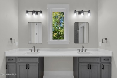 Experience elevated coastal living at 1624 Sunrise Lane in