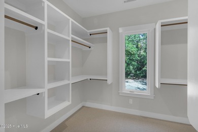 Experience elevated coastal living at 1624 Sunrise Lane in