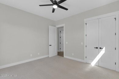 Experience elevated coastal living at 1624 Sunrise Lane in