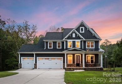 Quietly tucked along the wooded shoreline of Lake Wylie, this - photo 1