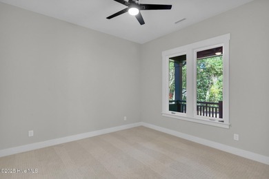 Experience elevated coastal living at 1624 Sunrise Lane in