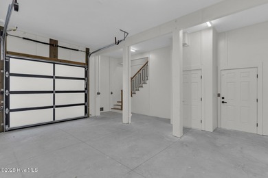 Experience elevated coastal living at 1624 Sunrise Lane in