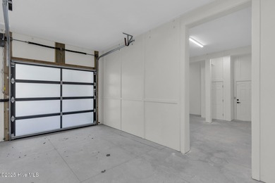 Experience elevated coastal living at 1624 Sunrise Lane in