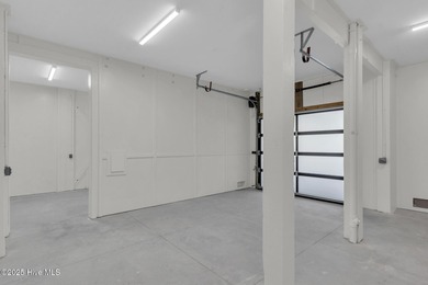 Experience elevated coastal living at 1624 Sunrise Lane in