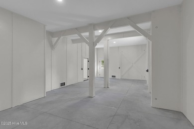 Experience elevated coastal living at 1624 Sunrise Lane in