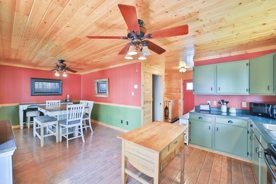 Experience the best of lake living in every season with this - photo 5