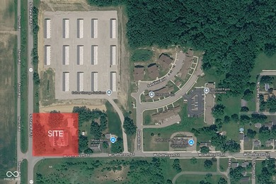 This 1.71-acre commercial site is strategically positioned just - photo 3
