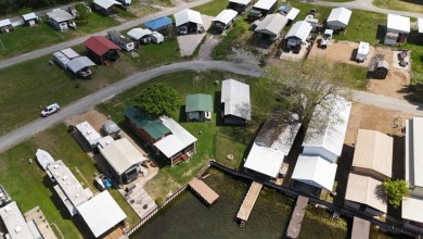 RV Lot w/Small RV, Awning and Pad at RC Lake! - photo 11
