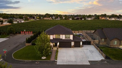 MLS# 293921 This exceptional 5-bedroom residence offers the - photo 1