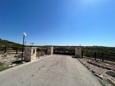 Beautiful 1-acre lot located in a private gated community at - photo 3