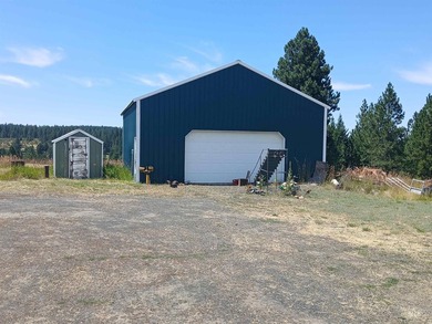 Rare hilltop acreage with 360 degree views in all directions - photo 2