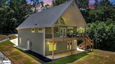 Meticulously maintained and move-in ready for summer lake living - photo 1
