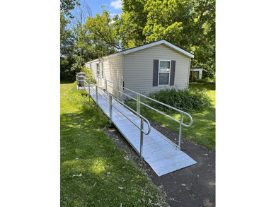 Experience small-town charm in Milaca, MN! This 2 bedroom/2 bath - photo 1