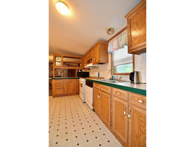 Experience small-town charm in Milaca, MN! This 2 bedroom/2 bath - photo 4