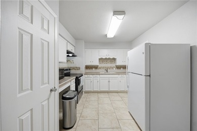 This inviting three-bedroom, one-bath home sits on a desirable - photo 15
