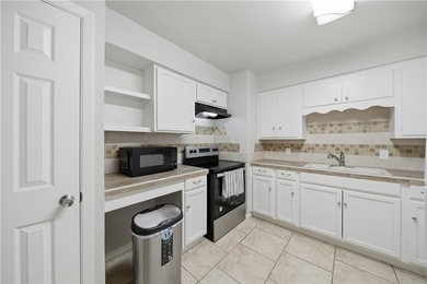 This inviting three-bedroom, one-bath home sits on a desirable - photo 16