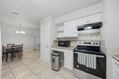 This inviting three-bedroom, one-bath home sits on a desirable - photo 17