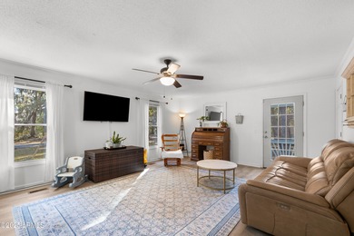 This well-designed ranch home offers 3 bedrooms, 2.5 baths, and