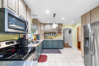 This well-designed ranch home offers 3 bedrooms, 2.5 baths, and