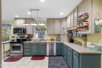 This well-designed ranch home offers 3 bedrooms, 2.5 baths, and