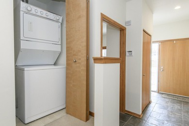Enjoy this sophisticated townhouse style condo near the river! - photo 11