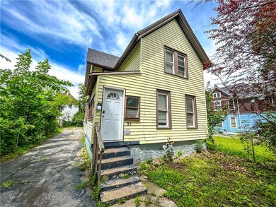 This spacious 4-bedroom, 1.5-bath Colonial in the City of - photo 1