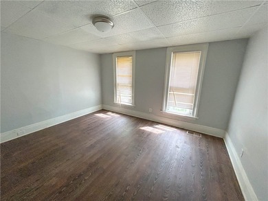 This spacious 4-bedroom, 1.5-bath Colonial in the City of - photo 3