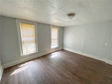 This spacious 4-bedroom, 1.5-bath Colonial in the City of - photo 4