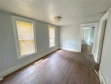 This spacious 4-bedroom, 1.5-bath Colonial in the City of - photo 5