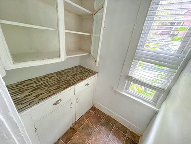 This spacious 4-bedroom, 1.5-bath Colonial in the City of - photo 8
