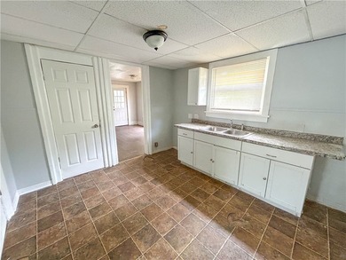 This spacious 4-bedroom, 1.5-bath Colonial in the City of - photo 9